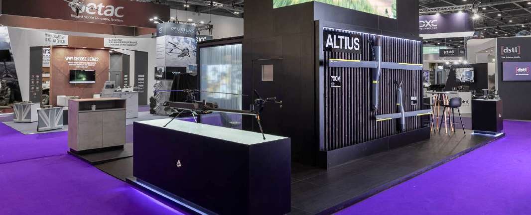 Dark Anduril defence stand displaying ALTIUS systems at DSEI 2023 in London